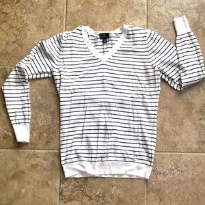 Black and white striped v neck sweater. Super soft and a staple for any closet!